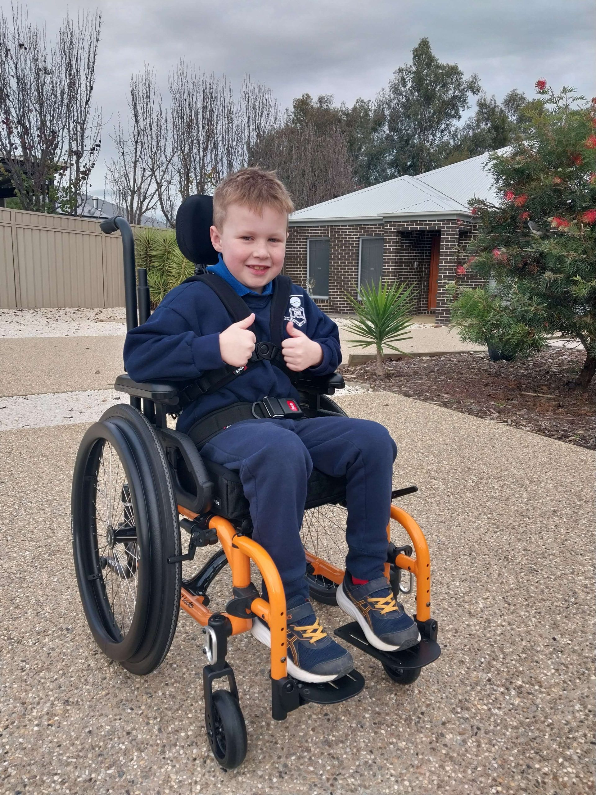 ndis participant logan on his new wheelchair